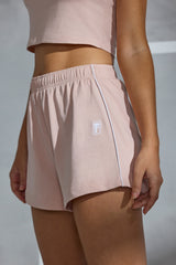 Piped Detail Mini Sweat Shorts in Peach